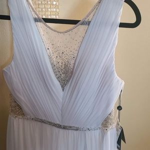 Stunning white Adrianna Papell dress. Could be a perfect wedding dress.
